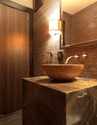 A bathroom with a sink and a mirror.